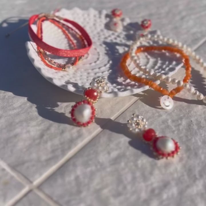 bright orange and coral summer jewelry made from freshwater pearls and natural gemstones