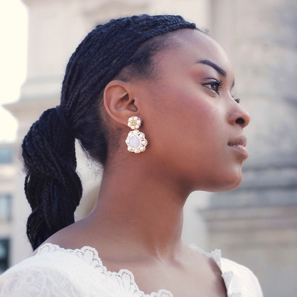 white flower shaped pearl earrings with gold details for brides