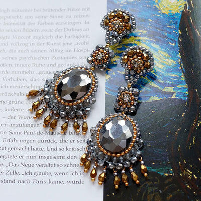 Big earrings with grey swarovski pearls and ocher beads