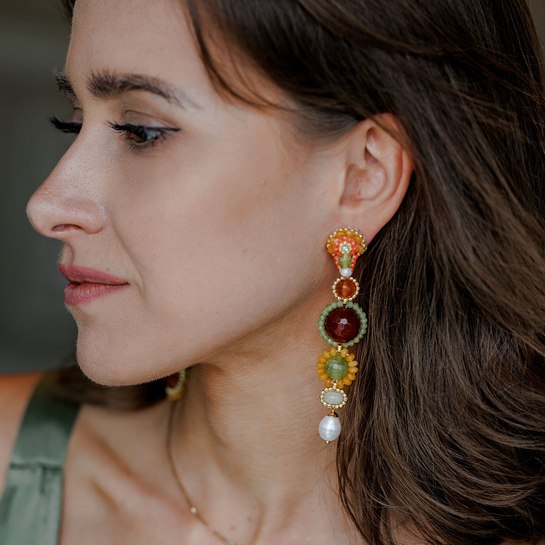 statement earring in asymmetrical design made from natural stones and high quality pearls
