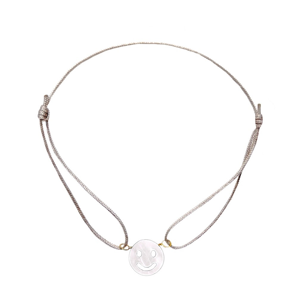Smile Symbol bracelet made from mother of pearl is a very robust and beautiful shiny material.