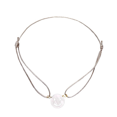 Smile Symbol bracelet made from mother of pearl is a very robust and beautiful shiny material.