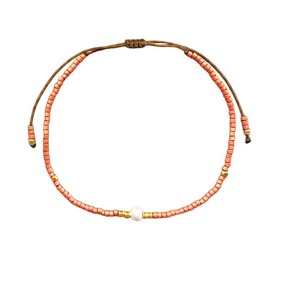 adjustable coral bracelet from natural stones and white freshwater pearl charm