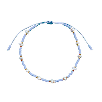 light blue bracelet from natural pearls and stones