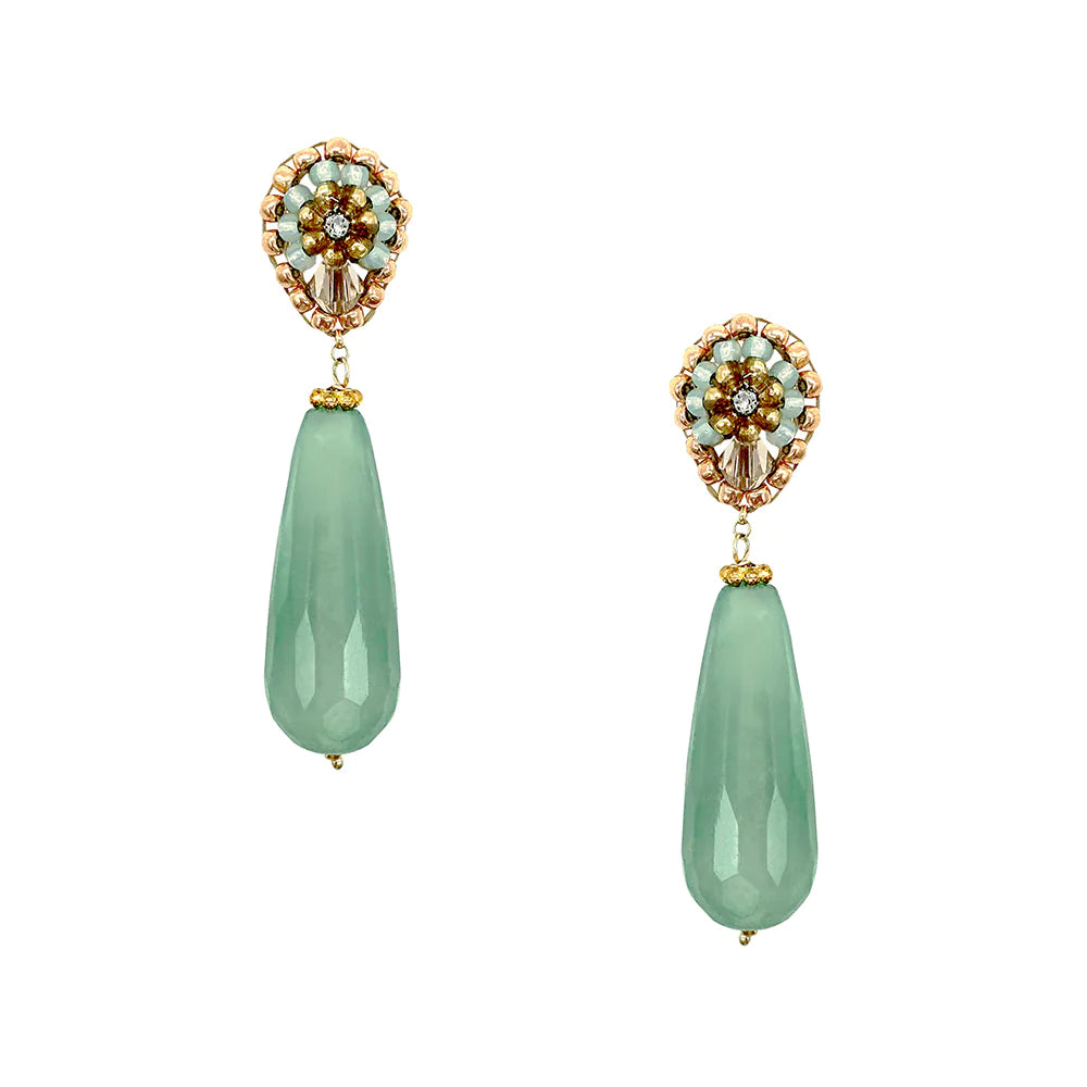 A pair of turquoise earrings made of natural stones and pearls with Swarovski crystals.