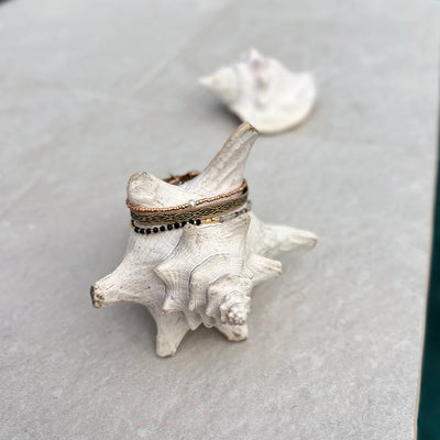 Perfect beach accessory: a three strand black-and-white beige bracelet set.