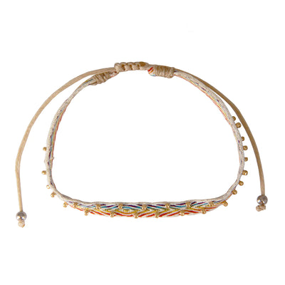 One fabric strand of a rainbow three strand bracelet set.