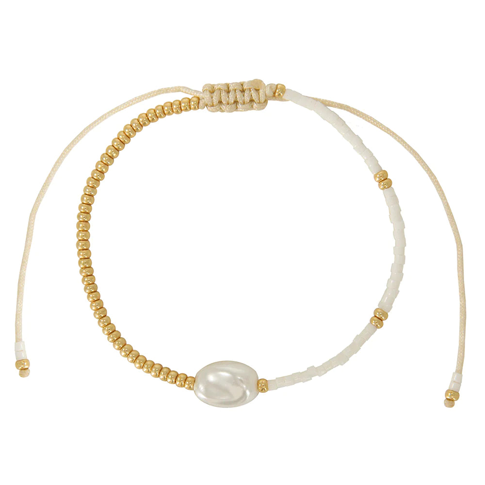 One pearl strand of a bracelet set.