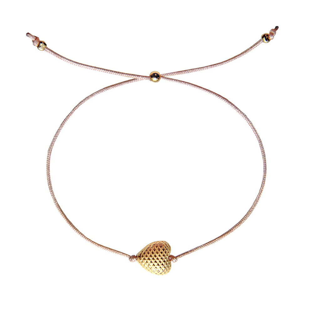 beige nylon thread bracelet with gold plated heart pendant
