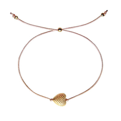 beige nylon thread bracelet with gold plated heart pendant