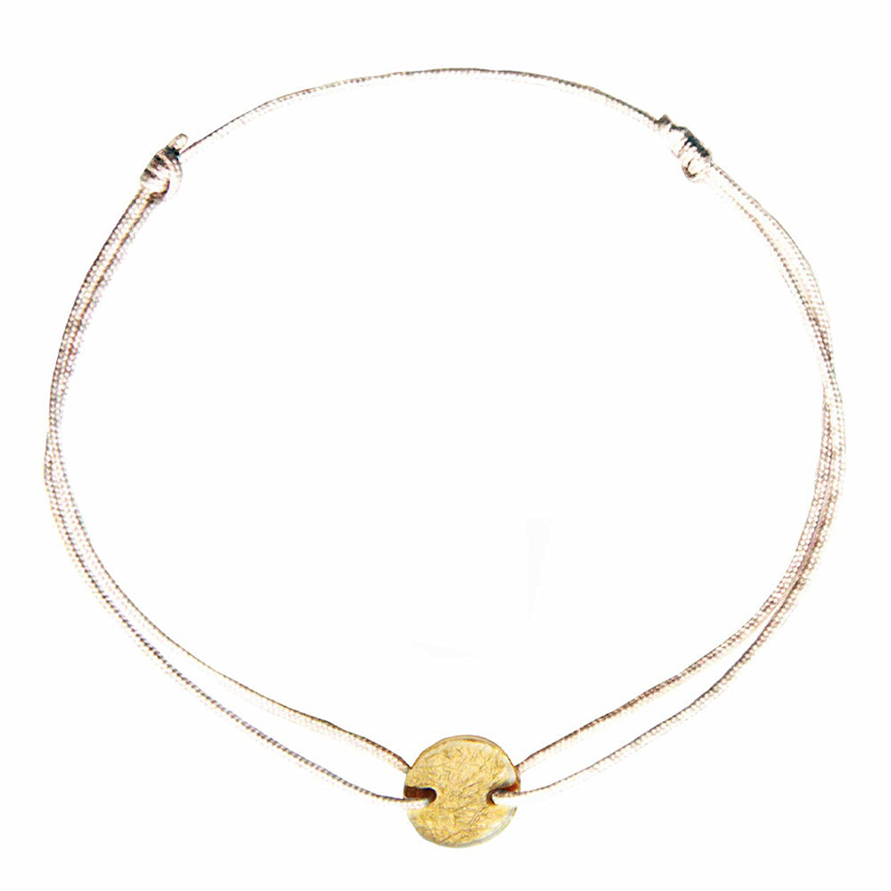 champagne coloured nylon thread bracelet with round gold plated pendant 
