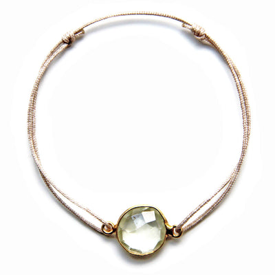 champagne coloured nylon thread bracelet with round beige smoky quartz gemstone