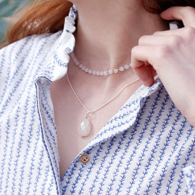 silver necklace with tear shaped rose quartz pendant