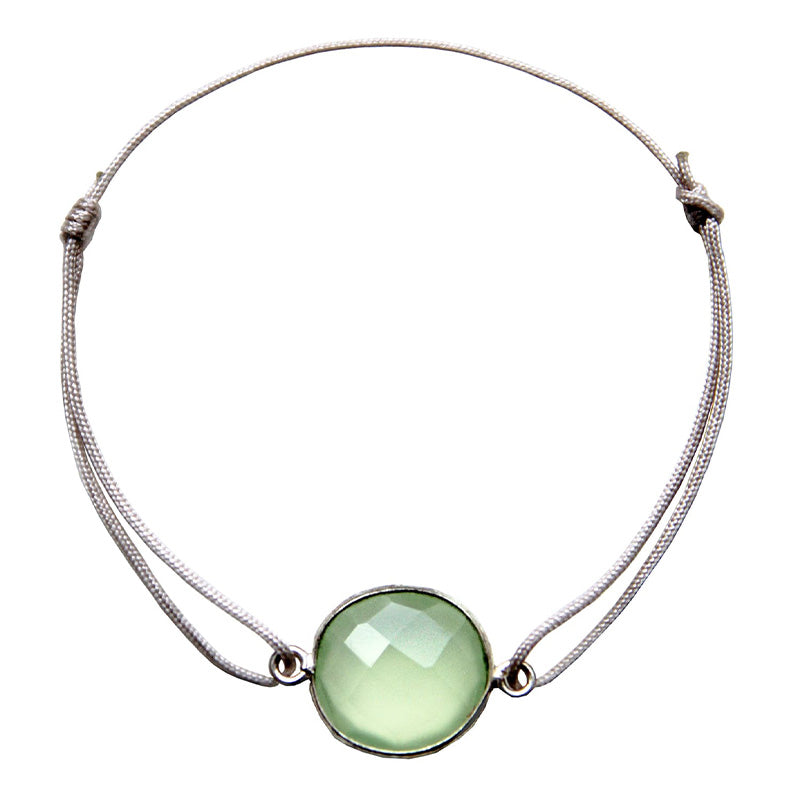 champagne coloured nylon thread bracelet with round green quartz gemstone
