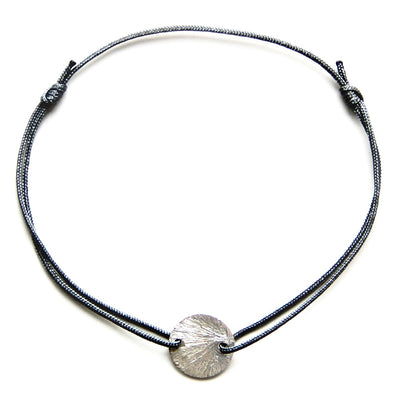 grey nylon thread bracelet with round silver pendant
