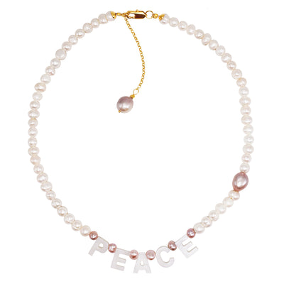 lilac and white freshwater pearl necklace with ‘peace’ letters out of nacre