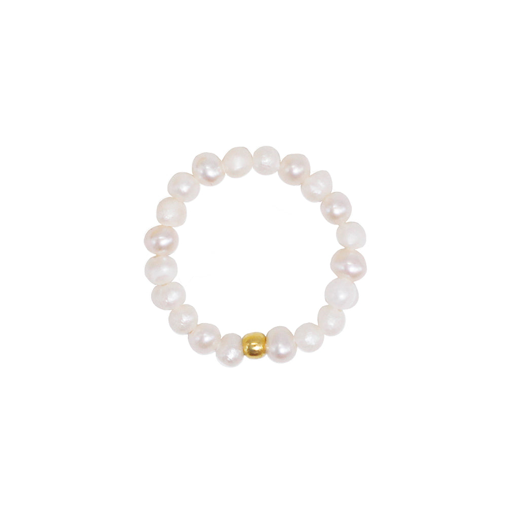 stretch ring out of small white freshwater pearls and a 18 karat gold plated pearl 