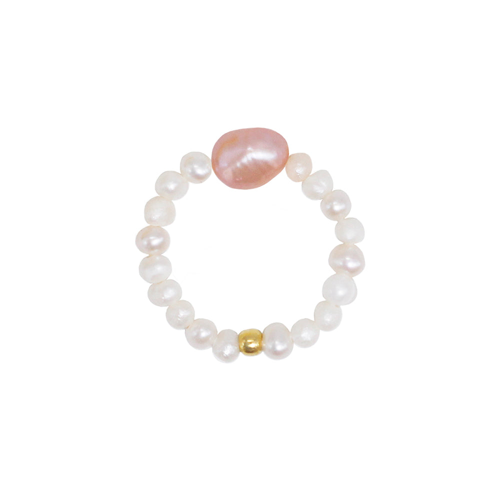stretch ring with small white freshwater pearls and a pink natural pearl