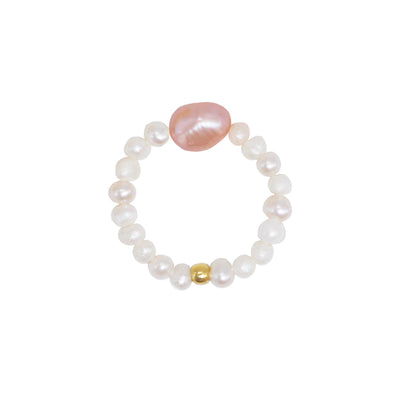 stretch ring with small white freshwater pearls and a pink natural pearl