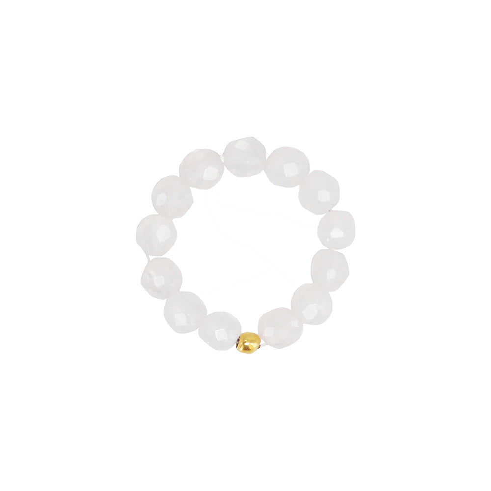 stretch ring out of white quartz stones and one 18k gold plated pearl
