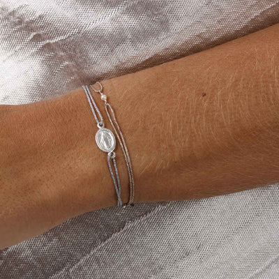 glittery beige nylon thread bracelet with small white freshwater pearl