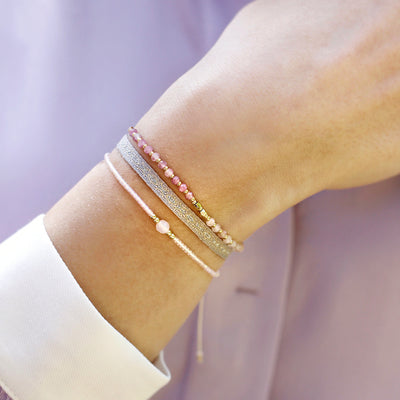 set of 3 bracelets with grey nylon band, freshwater pearls, rose quartz and light quartz stone