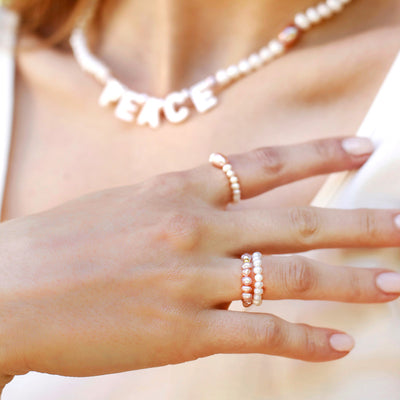 New Summer Trend: stretch rings out of small lilac and pink freshwater pearls and a 18 karat gold plated pearl 