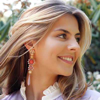 lilac colored statement earrings with round peach colored quartz stone and gold details