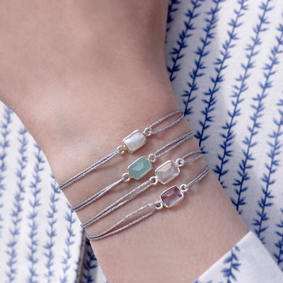glittery silver nylon thread bracelet with square turquoise quartz stone 