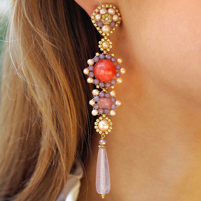 lilac colored statement earrings with round peach colored quartz stone and gold details