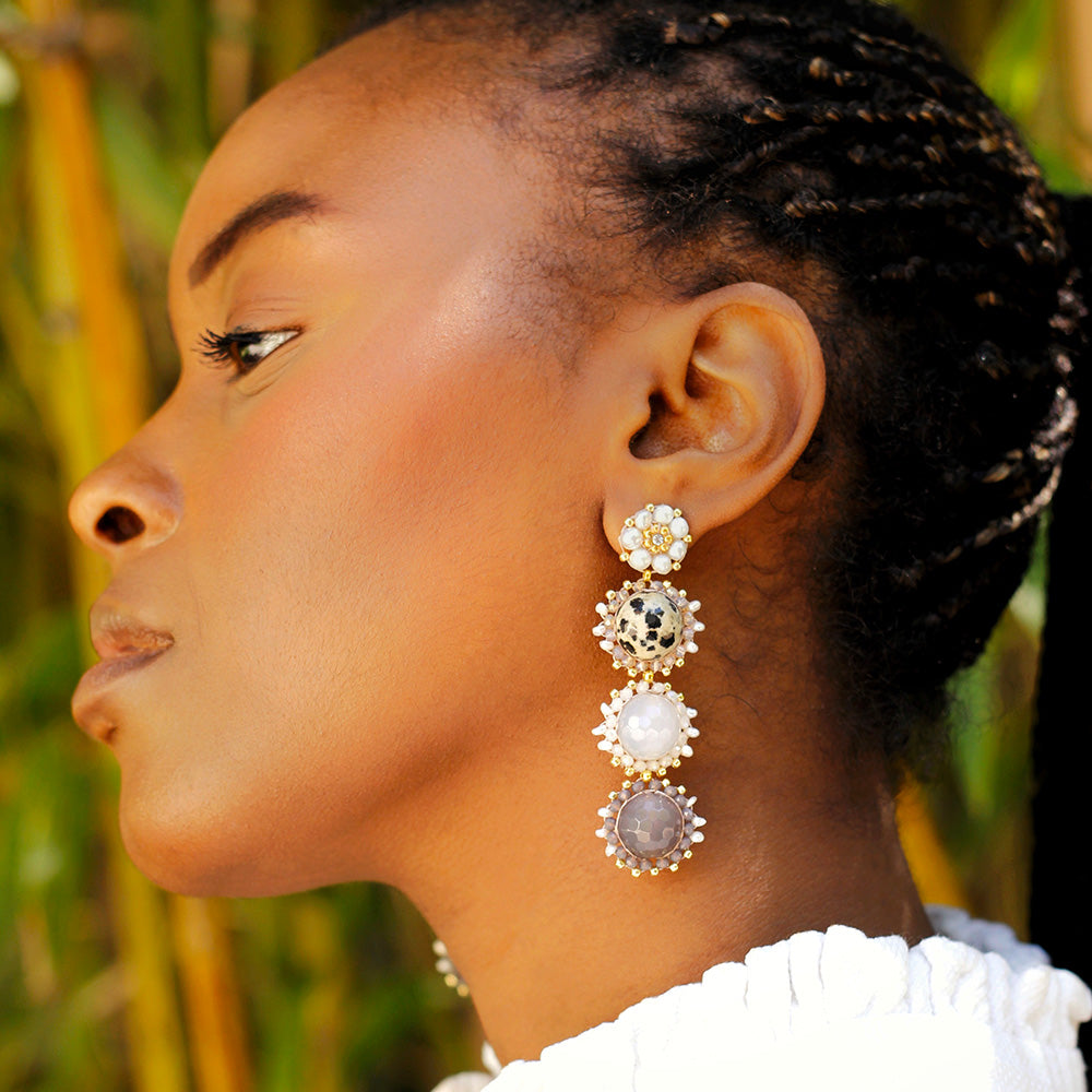 long statement earrings with round grey, white and leopard printed gemstones and small freshwater pearls