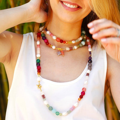multicolored gemstone necklace with freshwater pearls, onyx, carneol, pink agate, amethyst and jade stones