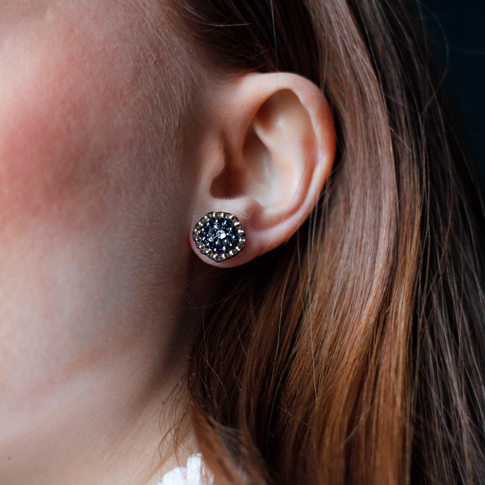 round earstuds with black and silver beads