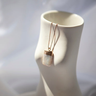 rosegold necklace with square cream coloured freshwater pearl pendant