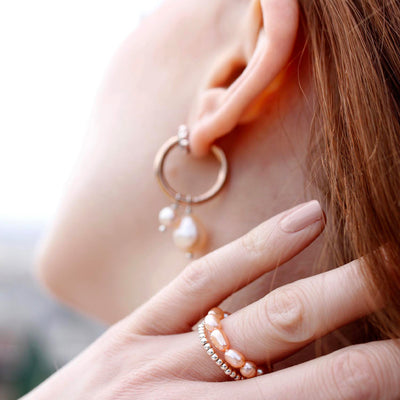 small rosegold hoops with rose colored freshwater pearls 