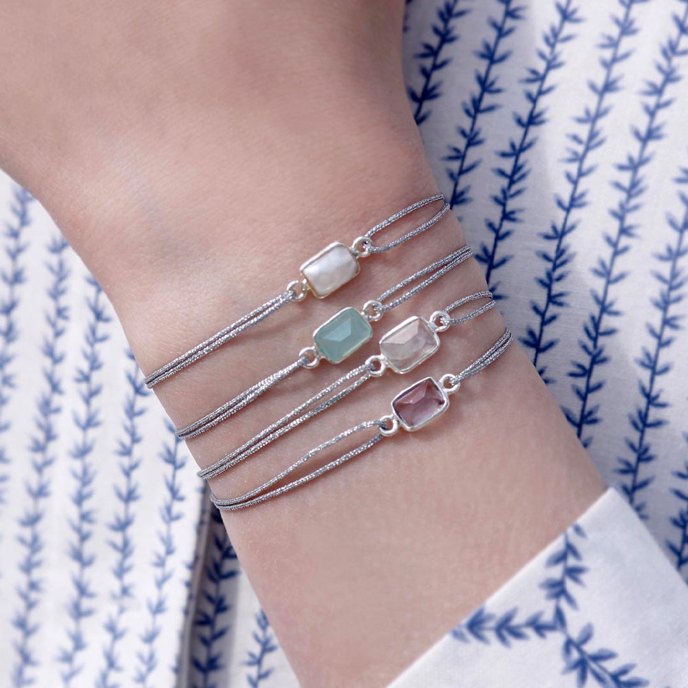 glittery silver nylon thread bracelet with square purple amethyst gemstone
