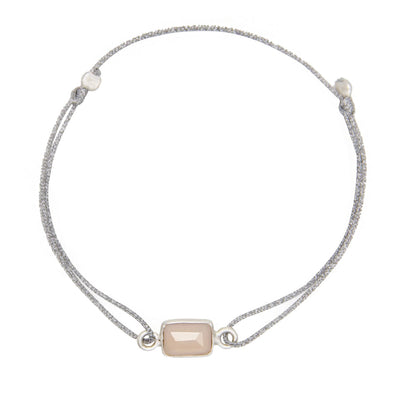 glittery silver nylon thread bracelet with round rose quartz gemstone