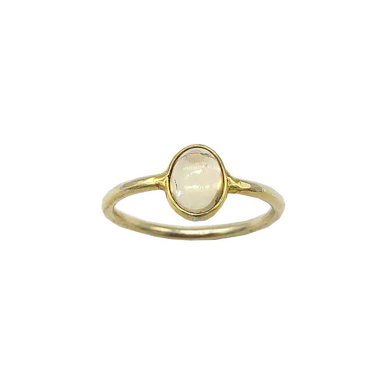 gold plated ring with beige oval shaped citrine gemstone