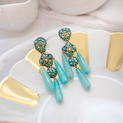 big statement earrings with turqoise agate stone drops and turquoise and green glass beads