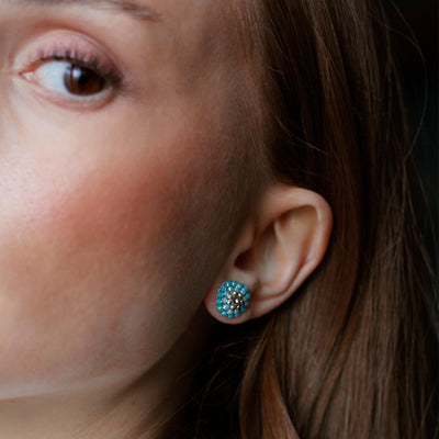 round earstuds made out of light blue and turquoise beads