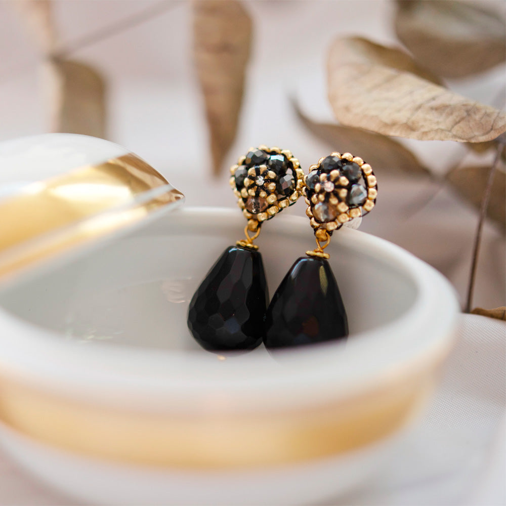 small black earrings with tear shaped black onyx stone and small golden beads