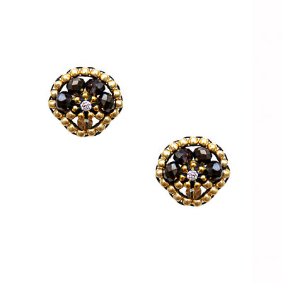 golden cone shaped earstuds made out of black and gold beads