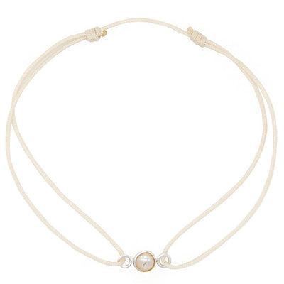 cream coloured nylon thread bracelet with small round freshwater pearl