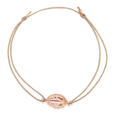 glittery beige bracelet with rosegold talisman 