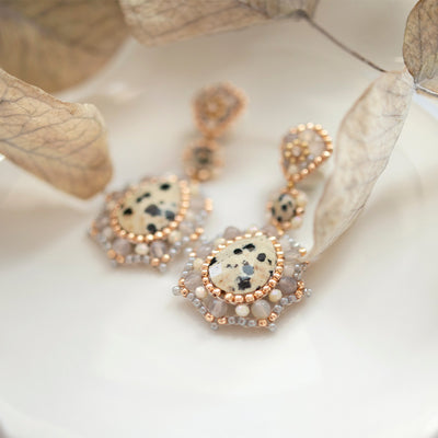 big statement earrings with beige specked quartz stone and taupe colored beads