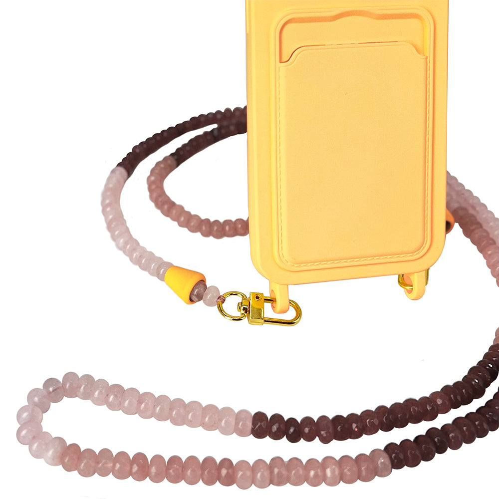 The perfect beach accessory: nude, brown, and gold gemstone beach phone necklace chain with a matching sunny yellow phone case.