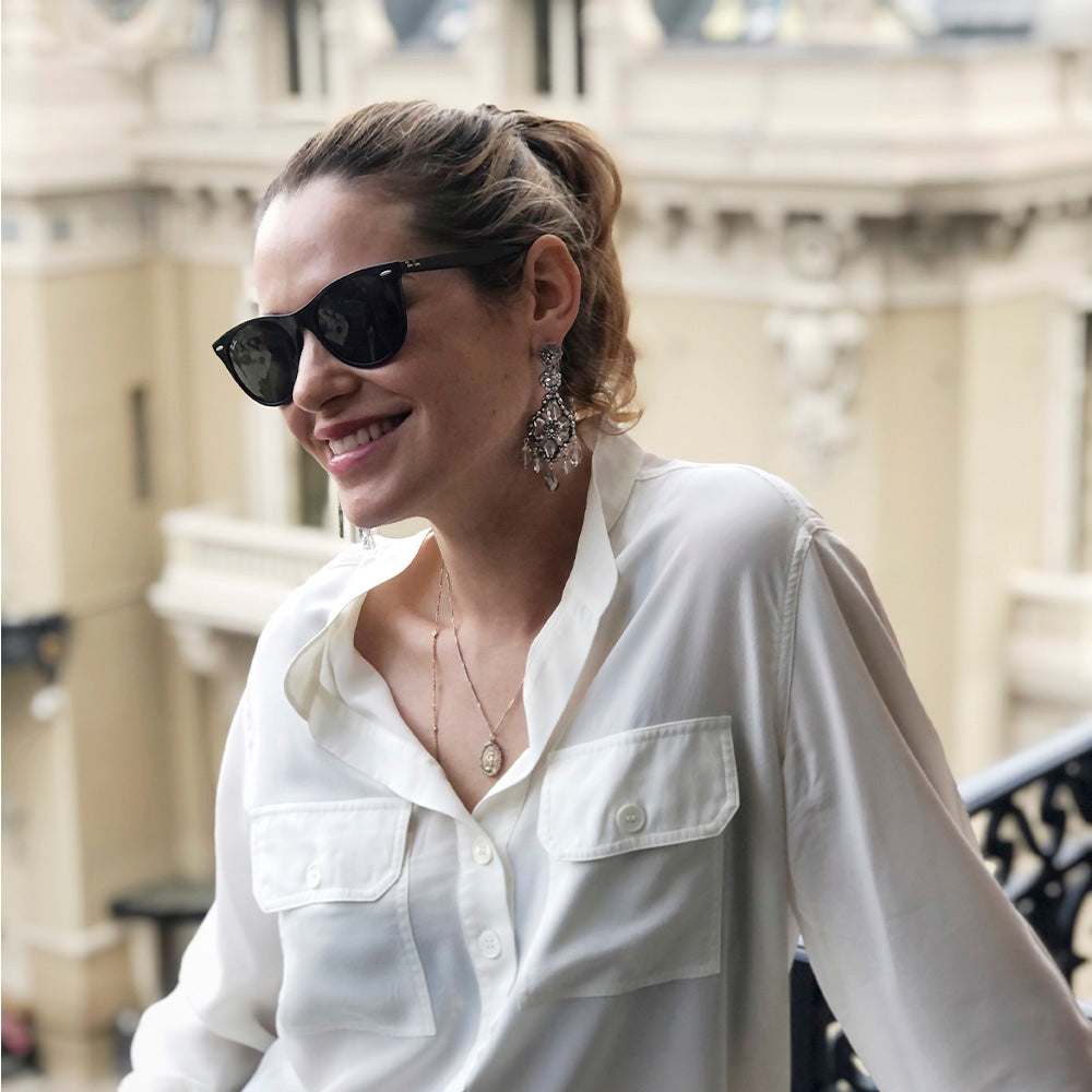 Lucrezia Gavazzi wearing big silver statement earrings with grey glass beads in Monte-Carlo