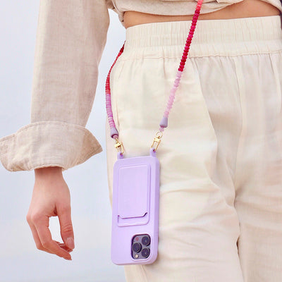 Summer vibes outfit with lilac phone case and trendy lilac and berry phone chain necklace.