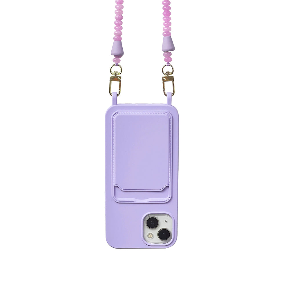 Summer lilac phone case connected to a matching phone chain necklace with berry red, pink, and lilac purple gemstones.