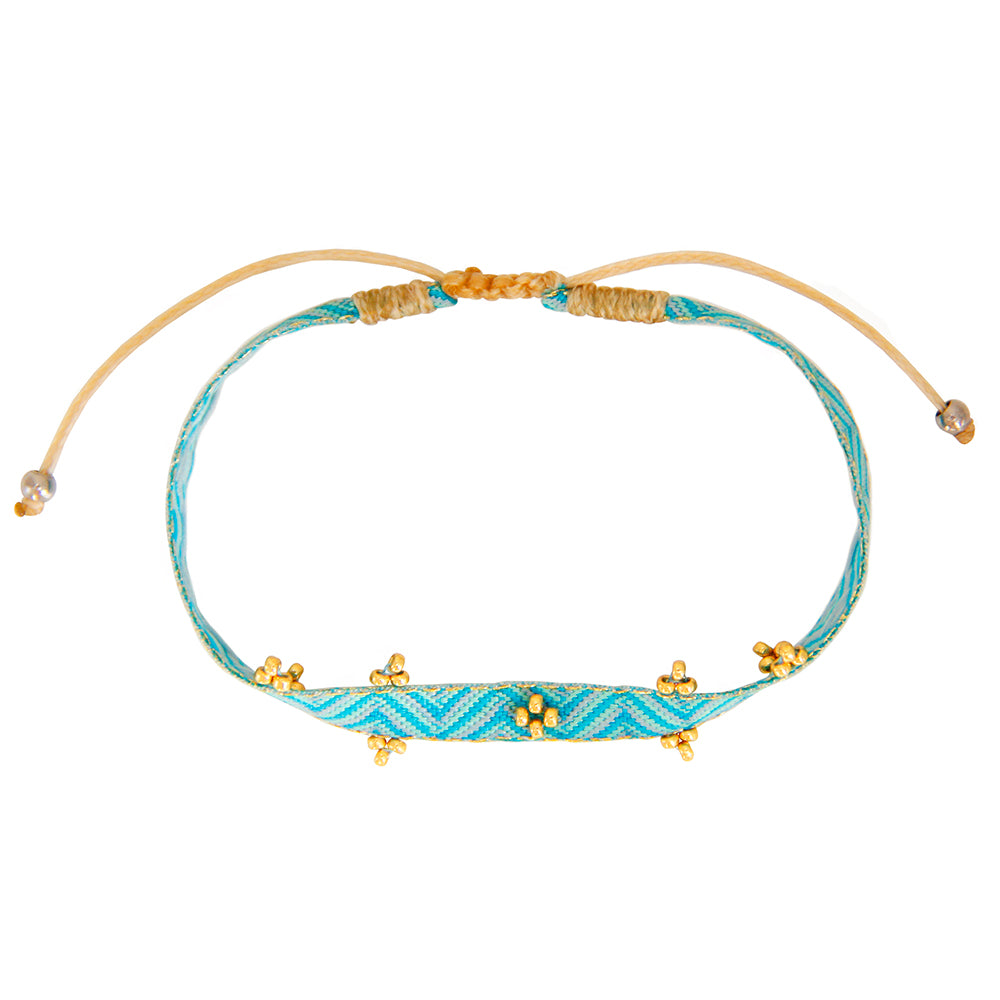 set of 2 bracelets with turquoise nylon band, small freshwater pearls and white and gold pearls